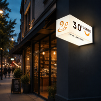 Enseigne lumineuse LED pour café, trois faces, montage en coin, éclairage blanc, texte noir, logo orange pour vitrine de café, signalétique commerciale