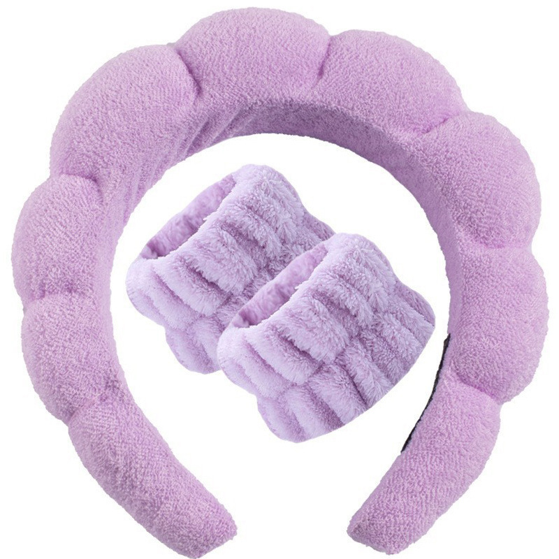 Dos pulseras moradas