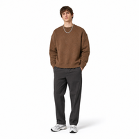 Sweat-shirt ample à col rond en molleton chiné, couleur unie, style streetwear, pour un usage quotidien décontracté