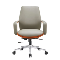 Chaise de bureau relaxante pour personnel de studio Chaise de visiteur en cuir artificiel à dossier court orange coloré pour le bureau