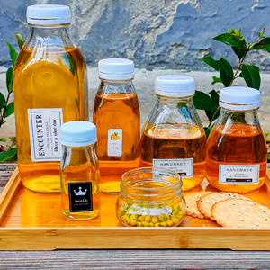 Nước ép sữa thủy tinh chai nước giải khát với vít có nắp đậy chai thủy tinh bán buôn 2oz 8oz 12oz 16oz 18OZ 32oz cho đồ uống có cồn - Product Image 4