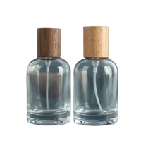 Vente en gros de flacons de parfum ronds en verre transparent de 15 ml, 30 ml, 50 ml, flacon vide pour cosmétiques et parfums avec bouchon pompe et boîte cadeau