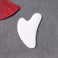 Outil de grattage coréen Produits de massage Anti-rides pour les yeux Vente en gros de massage personnalisé Planche de gua sha blanche Outil de grattage de gua sha en céramique