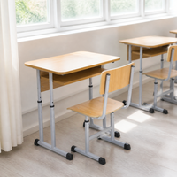 Ensemble de bureau et chaise d'étudiant pour salle de classe moderne avec structure tubulaire en acier, finition couleur bois, hauteur réglable, design écologique