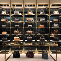 Supports pour sacs à main de luxe pour présentoirs de magasins Présentoir pour sacs fourre-tout Présentoir réglable en métal en acier inoxydable pour sacs à main Présentoir pour sacs