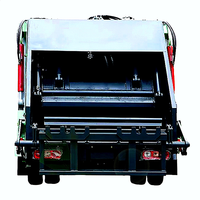 Véhicule de transfert de déchets compressés