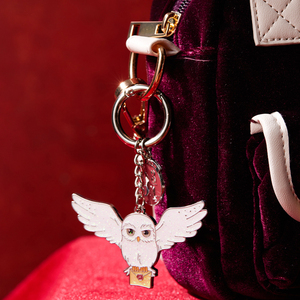 Porte-clés Hedwig <span class=keywords><strong>de</strong></span> la série <span class=keywords><strong>Harry</strong></span> <span class=keywords><strong>Potter</strong></span> <span class=keywords><strong>de</strong></span> MINISO, adorable objet <span class=keywords><strong>de</strong></span> collection pour les fans, porte-clés multifonctionnel, jouets en gros - Product Image 1