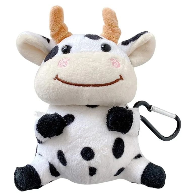 Venda quente adorável vaca preto e branco bluetooth fone de ouvido novo pelúcia capa de proteção chaveiro de vaca brinquedo de pelúcia