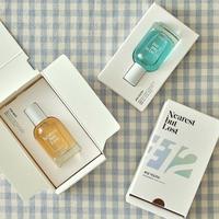 Emballage de luxe pour vernis à ongles en papier d'art texturé avec logo en relief Boîtes à cartes imprimées à l'encre noire pour parfum et soins de la peau