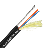 Kabel Serat Optik Flat Drop FTTH 2-12 Core G652D/G657a PBT Loose Tube FRP Central Strength Member PE Jacket GYFXTBY