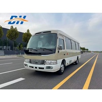 Mini-bus Coaster d'occasion 20 places Euro 4 Essence Transmission manuelle Fourgonnette de transport de passagers d'occasion