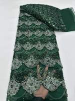 Tissu brodé de fleurs perlées pour robes de mariée et robes de soirée