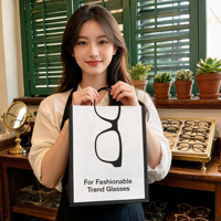 Sac de shopping en papier mat recyclable de qualité supérieure personnalisé avec laminage mat, sac d'emballage cadeau de luxe pour boutique de lunettes de marque