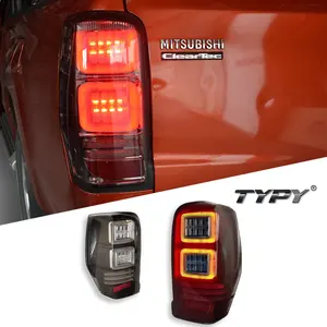 ชุดไฟท้าย LED TYPY สำหรับมิตซูบิชิ ไทรทัน ปี 2019-2023 พร้อมไฟ DRL และไฟเลี้ยวแบบไดนามิก เลนส์รมดำ/สีชา 12V รับประกัน 1 ปี - Product Image 1