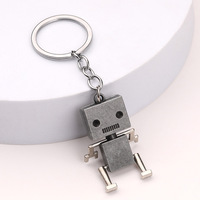 Cadeau unique de gadget personnalisé pour les amateurs de technologie Porte-clés robot porte-clés en métal Porte-clés robot mobile avec bras et jambes articulés