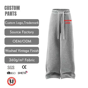 بنطال رياضي رجالي مبطن بالصوف من القطن ثقيل الوزن بقصة أرجل واسعة فضفاضة وتصميم شعار مخصص بتأثير عتيق مغسول - Product Image 1