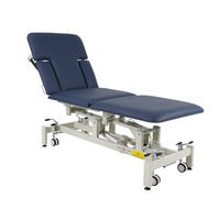 Équipement de physiothérapie Tecar, table de thérapie utilisée par les esthéticiennes, table de thérapie pour la décompression spinale, lit de traction chiropratique