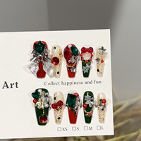 Ongles à presser de Noël de luxe faits main, rouges et verts, festifs, avec nœud de Père Noël et perles, réutilisables, OEM ODM pour femmes au quotidien