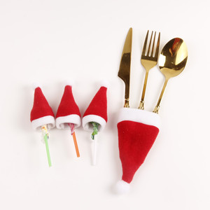 Juego de cubiertos con diseño de gorro navideño de terciopelo rojo de 4*7cm y 6*12cm para decoración de mesa navideña - Product Image 1