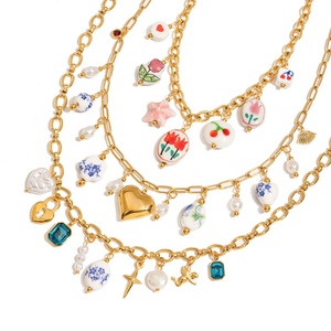 Collier tendance anti-ternissement en or 18 carats, véritable acier inoxydable, pendentif cœur en céramique, zircon et perle pour femmes et jeunes filles - Product Image 1