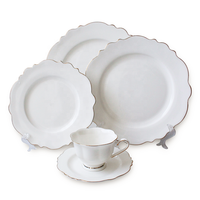 Vente en gros d'assiettes colorées en céramique de tournesol, service de table en porcelaine avec bordure dorée