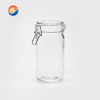 Vente en gros d'ustensiles de cuisine OEM bocal et bouteille en verre personnalisés pour le stockage des aliments bocal à bonbons en verre transparent hermétique avec couvercle en verre siliconé