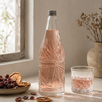 Bouteille de vin en verre transparent de 700 ml à motif en relief avec col fileté, idéale pour l'emballage de vin de fruits et de liqueur