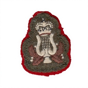 Ceci est un insigne d'armure ou de grade militaire britannique pour les musiciens ou les membres des groupes de musique. - Product Image 1