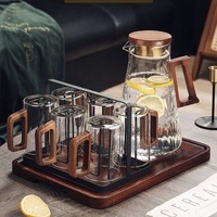 Ensemble de 6 tasses en gros verre borosilicate transparent de luxe avec couvercle ensemble de gobelets résistant à la chaleur avec manche en bois confortable