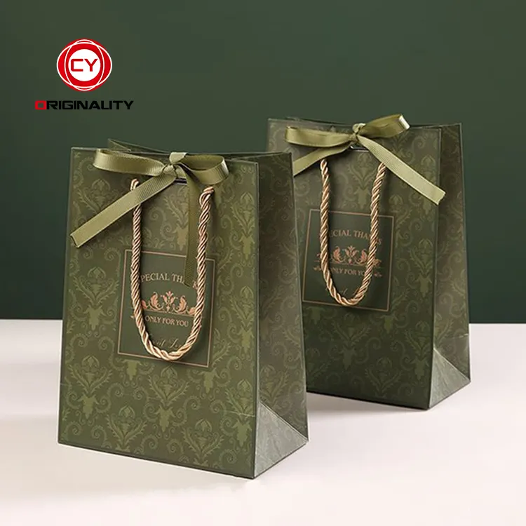 Regalo di compleanno piccolo sacchetto di carta biodegradabile di lusso in oro rosa in rilievo