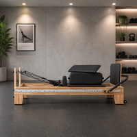 Reformer en bois personnalisé avec rail intégral en érable pour studio de Pilates et de yoga