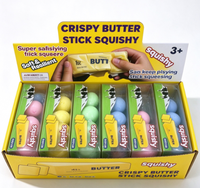 En gros Jouet Squishy en forme de bâton de beurre croustillant avec cœur en boule de riz croustillante en TPR, à rebond lent, anti-stress, sensoriel, boîte de présentation en vrac