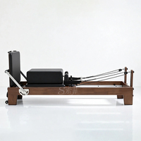 Reformer Pilates en chêne, machine de Pilates pliable pour yoga et Pilates, fabricant d'usine