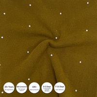 Tissu extensible côtelé vert olive orné de perles |   37% rayonne 30% acrylique 28% coton 5% élasthanne OEKO-TEX Écologique