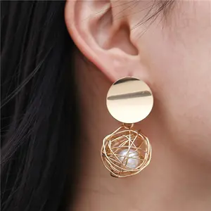 Wholesale New Punk Round Geometric Earrings Creative Woven Hollow Ball Artificial Pearl Stud Earrings for Women