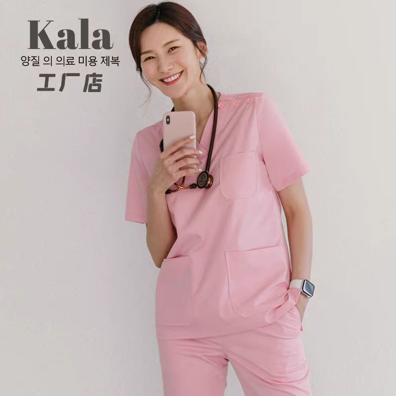Costume rose stretch à manches courtes pour femme