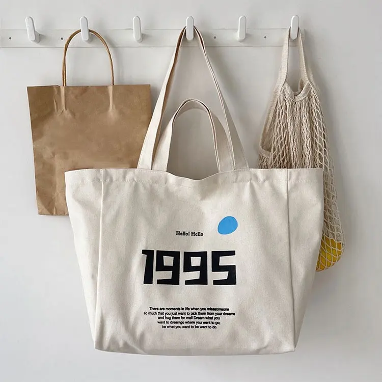 Bolso de mano grande de lona blanca de compras de algodón con logotipo personalizado con bolsillo y cremallera