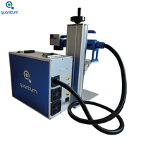 Machine de gravure laser à fibre portative Quantum Mini pour métal et plastique avec table de travail 3D et cercle de mise au point
