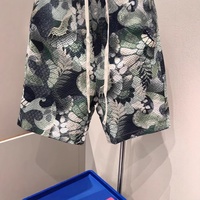 Nouveauté 2025 – Short de plage décontracté pour homme, style américain, tendance, coupe ample, motif floral, séchage rapide, en nylon/cachemire, avec cordon de serrage
