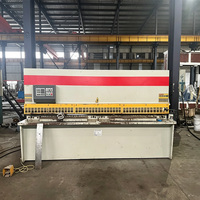 Kullanılmış Çok Fonksiyonlu Hidrolik CNC Kesme Makinesi Metal Levha Sabit Uzunlukta Kesme Makinesi Asansör Kabin Kapısı İşleme İçin