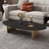 Table basse ovale moderne minimaliste de luxe léger avec plateau en ardoise et structure métallique pour salon et usage domestique