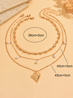 Collier à pampilles en perles d'imitation multicouches avec chaîne dorée au design minimaliste, pendentif cœur populaire, ensemble de bijoux en alliage pour femme
