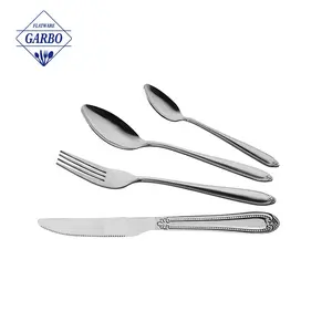 Wholesale Set of 4 Pieces Silverware Table Knife Fork Spoon Embossed Handle Water Polish 410ss Cutlery Set with Thicknee 1mm
