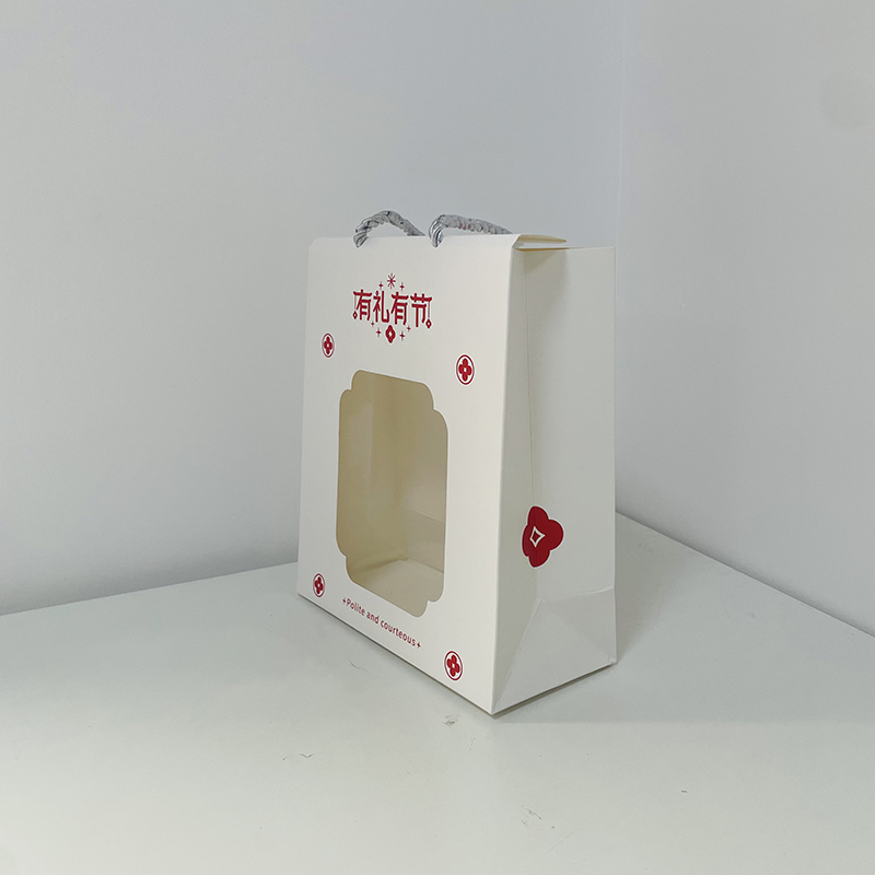Hot-selling Luxury Eco-Friendly White Paper Embossed Logo Die-Cut Handles Fashionable Make-Up Shopping Bags with Ribbon