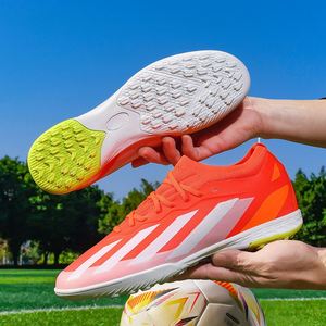 Botas de fútbol FG/TF al por mayor OEM/ODM para adultos y jóvenes, con opciones antideslizantes, ligeras y transpirables de tejido. - Product Image 5