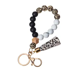 Pendant Wrist bag Key Chain Pendant Leather bracelet Fringe bracelet Key ring Wooden silicone bead key ring