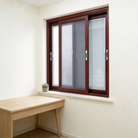 Fenêtre coulissante insonorisée et isolante pour balcon de résidence en immeuble urbain de grande hauteur, fabriquée par l'usine HUACAI.