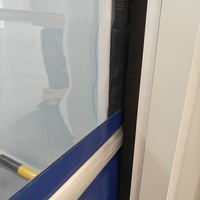 Puerta Rápida Lateral de Aluminio de Diseño Moderno con Control PLC, Seguridad Infrarroja y Función Antiviento para Fábricas y Logística