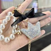 Pendentif porte-clés de luxe en forme de couronne avec perle et nœud, idéal pour téléphone, sac et clés de voiture, fabriqué en Chine