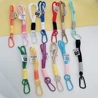 En gros, porte-clés promotionnel en nylon tressé style boxe, cordon de suspension pour voiture et téléphone portable, accessoires de charme chics